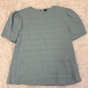 Women’s size Large Light Blue/Green Blouse. Fits like a MEDIUM.